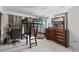 Cozy bedroom with a loft bed, desk, and natural light, perfect for relaxation and study at 4659 Helena Ne St, St Petersburg, FL 33703