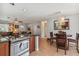 Open floor plan featuring the kitchen with stainless steel appliances and a breakfast nook at 4659 Helena Ne St, St Petersburg, FL 33703