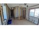 Room undergoing renovation featuring a framed wall, tiled floors and a window at 4659 Helena Ne St, St Petersburg, FL 33703