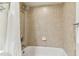 Clean bathroom with shower/tub combo and white tile at 11605 Gulf Blvd # 507, Treasure Island, FL 33706