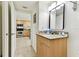 Bathroom with vanity and partial kitchen view at 11605 Gulf Blvd # 507, Treasure Island, FL 33706