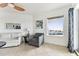 Bright living room with ocean view, comfy seating, and tiled floors at 11605 Gulf Blvd # 507, Treasure Island, FL 33706