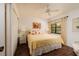 Bright bedroom with a king-size bed and an ensuite bathroom at 12300 Vonn Rd # 9205, Largo, FL 33774
