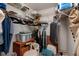 Large walk-in closet with shelving, rods, and storage at 12300 Vonn Rd # 9205, Largo, FL 33774