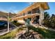 Building exterior showcasing parking and landscaping at 12300 Vonn Rd # 9205, Largo, FL 33774