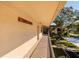 Hallway with exterior view and access to condo unit at 12300 Vonn Rd # 9205, Largo, FL 33774