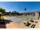 Two shuffleboard courts and nearby tennis courts at 12300 Vonn Rd # 9205, Largo, FL 33774