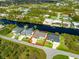 Property aerial view showcasing canal front location at 15136 Hennipen Cir, Port Charlotte, FL 33981