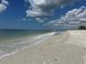 Relaxing beach with white sand and calm waters at 15136 Hennipen Cir, Port Charlotte, FL 33981