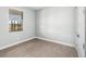 Bright bedroom with a window and wood-look floors at 15136 Hennipen Cir, Port Charlotte, FL 33981