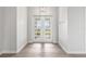Bright and airy entryway with double doors leading to the backyard at 15136 Hennipen Cir, Port Charlotte, FL 33981