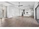 Open concept living room with kitchen and lanai access at 15136 Hennipen Cir, Port Charlotte, FL 33981