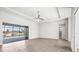 Main bedroom with sliding glass doors leading to the pool area at 15136 Hennipen Cir, Port Charlotte, FL 33981