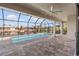 Spacious screened-in pool and patio area with water view at 15136 Hennipen Cir, Port Charlotte, FL 33981