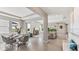 Open concept living and dining area featuring abundant natural light and a smooth transition to the living space at 16030 10Th E Ave, Bradenton, FL 34212