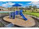 playground with a blue playset and slide at 16030 10Th E Ave, Bradenton, FL 34212