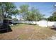 Large backyard with a storage shed and privacy fence at 1779 Shore Acres Ne Blvd, St Petersburg, FL 33703