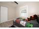 Charming bedroom with a twin-sized bed and plenty of natural light at 1779 Shore Acres Ne Blvd, St Petersburg, FL 33703