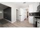 Clean hallway with access to laundry and storage areas at 1779 Shore Acres Ne Blvd, St Petersburg, FL 33703