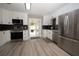 Updated kitchen with stainless steel appliances and granite countertops at 1779 Shore Acres Ne Blvd, St Petersburg, FL 33703