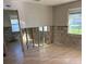 Kitchen undergoing renovation with new flooring installed at 1779 Shore Acres Ne Blvd, St Petersburg, FL 33703
