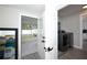 Convenient laundry room with a view of the backyard at 1779 Shore Acres Ne Blvd, St Petersburg, FL 33703