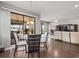 Casual dining area with glass table and chairs near living room at 19757 Long Lake Ranch Blvd, Lutz, FL 33558