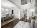 Elegant foyer with hardwood floors, high ceilings, and an open view of the dining area and living spaces at 19757 Long Lake Ranch Blvd, Lutz, FL 33558