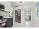 Modern kitchen with stainless steel appliances and access to the backyard at 205 Kingston S St, St Petersburg, FL 33711