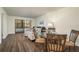 Open concept dining area with view into living room at 206 Tarpon Pt, Tarpon Springs, FL 34689