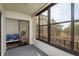 Spacious lanai with sliding doors leading to bedroom at 206 Tarpon Pt, Tarpon Springs, FL 34689