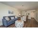 Bright living room with comfy seating and coastal decor at 206 Tarpon Pt, Tarpon Springs, FL 34689
