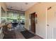 Condo parking garage with elevator access and seating area at 206 Tarpon Pt, Tarpon Springs, FL 34689