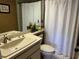 Clean bathroom with shower/tub combo, toilet, and vanity at 2531 Royal Pines Cir # 23G, Clearwater, FL 33763