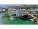 Aerial view of two waterfront condo buildings and surrounding area at 400 64 Ave # 1207, St Pete Beach, FL 33706