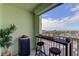 Spacious balcony with water views and seating for two at 400 64 Ave # 1207, St Pete Beach, FL 33706