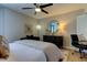 Bright bedroom with a comfortable bed and home office area at 400 64 Ave # 1207, St Pete Beach, FL 33706