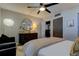 Relaxing bedroom with a dresser and large mirror at 400 64 Ave # 1207, St Pete Beach, FL 33706