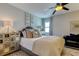 Comfortable bedroom with plush bedding and a dresser at 400 64 Ave # 1207, St Pete Beach, FL 33706