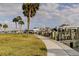 Concrete walkway leads to boat slips and marina at 400 64 Ave # 1207, St Pete Beach, FL 33706