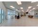 Community room with seating, tables, and water views at 400 64 Ave # 1207, St Pete Beach, FL 33706