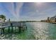 Wooden dock offering access to the water with a beautiful view at 400 64 Ave # 1207, St Pete Beach, FL 33706