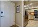 Bright entryway with view into kitchen at 400 64 Ave # 1207, St Pete Beach, FL 33706