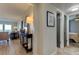 Hallway with view into living room and bedroom at 400 64 Ave # 1207, St Pete Beach, FL 33706