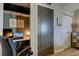 Home office with a built in desk and storage at 400 64 Ave # 1207, St Pete Beach, FL 33706