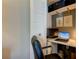 Stylish home office features built-in shelving and a workspace at 400 64 Ave # 1207, St Pete Beach, FL 33706