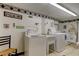 Shared laundry facility with multiple washers and dryers at 400 64 Ave # 1207, St Pete Beach, FL 33706
