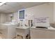 Clean and well-maintained laundry facility with multiple washers and dryers at 400 64 Ave # 1207, St Pete Beach, FL 33706