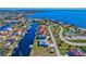 Aerial view of home situated on a canal with nearby park at 4509 Colleen St, Port Charlotte, FL 33952