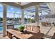 Outdoor dining area with water view at 5210 Covesound Way, Apollo Beach, FL 33572